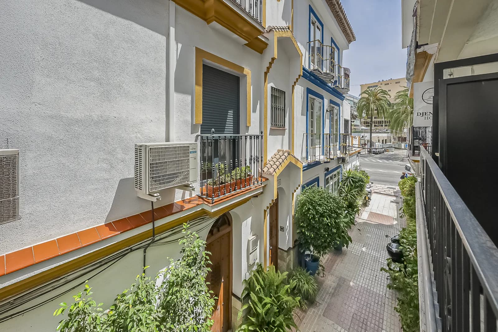 The view from the Signature Suite with Balcony, over the white houses and wrought iron of the old town