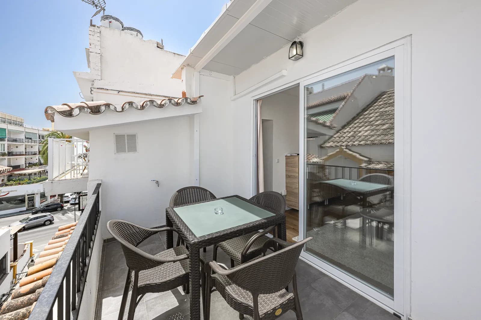 The terrace of Room 5, over the tiled roofs of the old town